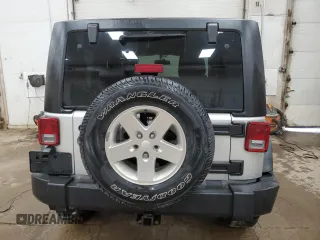 2012 Jeep Wrangler Sport with VIN 1C4AJWAGXCL133013, listed as a Copart auction lot 59788325 with 141,015 mi miles and Clean title. Bid and sale history available at DreamBid. Image 6.