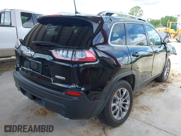 2021 Jeep Cherokee Latitude Lux with VIN 1C4PJMMXXMD158385, listed as a IAAI auction lot 42413514 with 86,163 mi miles and . Bid and sale history available at DreamBid. Image 4.