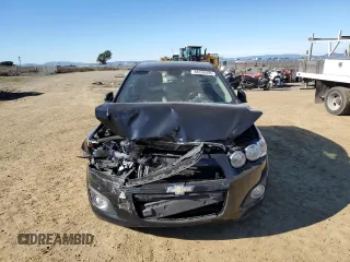 2012 Chevrolet Sonic LTZ z VIN 1G1JE6SH5C4195594, wystawiony jako Copart lot #88336435 z przebiegiem 105 112 mil mil oraz Szkoda całkowita • Salvage title. Historia ofert i sprzedaży dostępna na DreamBid. Obrazek 5.