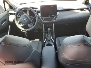2023 Toyota Corolla Cross XLE с VIN 7MUDAABG9PV076750, выставлен на аукционе Copart как лот 51434765 с пробегом Не указан миль и Списание • Salvage title. История ставок и продаж доступна на DreamBid. Изображение 8.