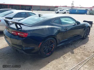 2019 Chevrolet Camaro 1LT with VIN 1G1FB1RX5K0133813, listed as a IAAI auction lot 41927669 with 89,557 mi miles. Bid and sale history available at carsss.com. Image 4.