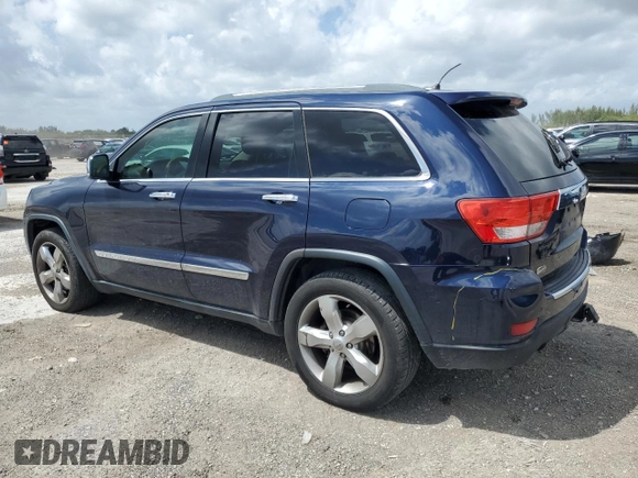 2013 Jeep Grand Cherokee Overland with VIN 1C4RJECT0DC533848, listed as a Copart auction lot 51319385 with 181,436 mi miles and Salvage Title. Bid and sale history available at carsss.com. Image 2.