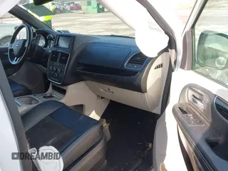 2019 Dodge Grand Caravan SXT with VIN 2C4RDGCG4KR771745, listed as a IAAI auction lot 41859267 with 97,436 mi miles and . Bid and sale history available at DreamBid. Image 5.