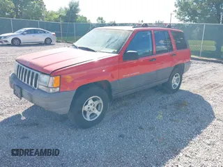 1998 Jeep Grand Cherokee Laredo with VIN 1J4FX58S9WC137514, listed as a IAAI auction lot 42305247 with 228,669 mi miles and . Bid and sale history available at DreamBid. Image 2.
