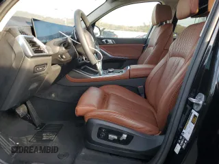 2024 BMW X7 xDrive40i with VIN 5UX23EM02R9V74498, listed as a Copart auction lot 82668234 with 9,469 mi miles and Salvage Title. Bid and sale history available at carsss.com. Image 7.