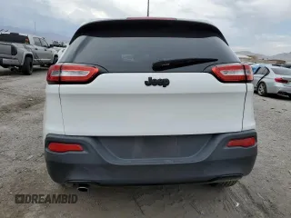 2017 Jeep Cherokee Altitude with VIN 1C4PJLAB2HW573567, listed as a Copart auction lot 59630205 with 105,975 mi miles and Salvage title. Bid and sale history available at DreamBid. Image 6.