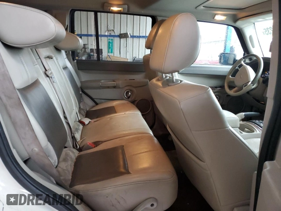 2010 Jeep Commander Limited with VIN 1J4RG5GT0AC137563, listed as a Copart auction lot 54178235 with 146,196 mi miles and Salvage title. Bid and sale history available at DreamBid. Image 11.