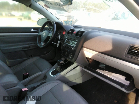 2009 Volkswagen Jetta Wolfsburg Edition with VIN 3VWRJ71K19M013277, listed as a IAAI auction lot 34707512 with 129,034 mi miles and . Bid and sale history available at DreamBid. Image 5.