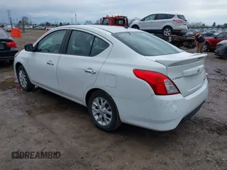 2015 Nissan Versa SV with VIN 3N1CN7APXFL959195, listed as a IAAI auction lot 42107455 with 102,088 mi miles. Bid and sale history available at carsss.com. Image 3.