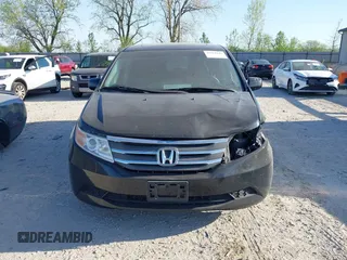 2012 Honda Odyssey EX-L with VIN 5FNRL5H6XCB016801, listed as a IAAI auction lot 42112141 with 164,671 mi miles and . Bid and sale history available at carsss.com. Image 12.