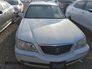 2000 Acura RL with VIN JH4KA9654YC000685, listed as a Copart auction lot 73986054 with 0 mi miles and Salvage Title. Bid and sale history available at carsss.com. Image 5.