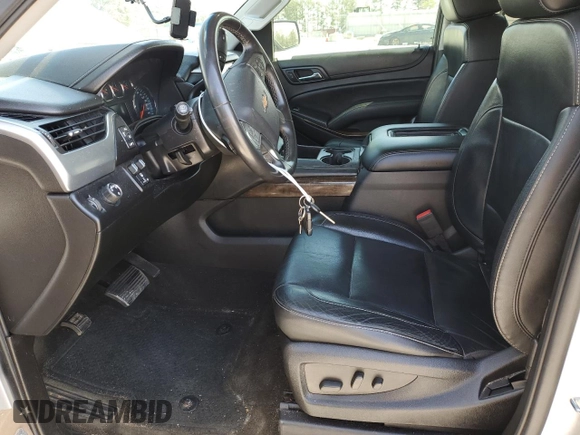 2015 Chevrolet Tahoe LT with VIN 1GNSCBKC9FR741455, listed as a Copart auction lot 50526445 with 157,252 mi miles and Salvage Title. Bid and sale history available at DreamBid. Image 7.