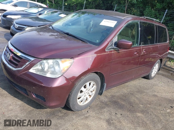 2010 Honda Odyssey EX with VIN 5FNRL3H59AB103405, listed as a IAAI auction lot 42442253 with 129,784 mi miles and . Bid and sale history available at DreamBid. Image 2.