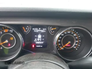 2021 Jeep Wrangler Unlimited Sport S with VIN 1C4HJXDN0MW678801, listed as a IAAI auction lot 42211815 with 96,849 mi miles and . Bid and sale history available at DreamBid. Image 7.