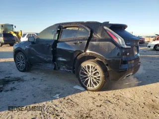 2024 Cadillac XT4 FWD Sport with VIN 1GYFZER47RF101186, listed as a Copart auction lot 79128454 with 10,499 mi miles and Salvage title. Bid and sale history available at DreamBid. Image 2.