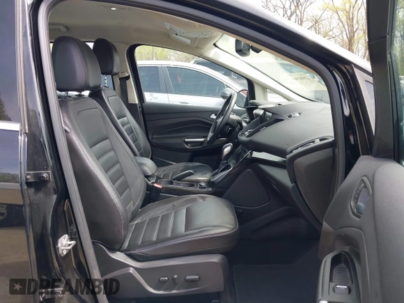 2017 Ford C-Max Energi Titanium with VIN 1FADP5FU2HL115199, listed as a IAAI auction lot 42001944 with 57,609 mi miles. Bid and sale history available at carsss.com. Image 5.