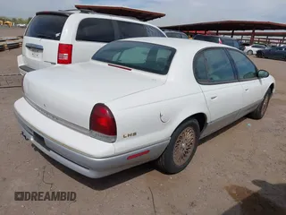 1997 Chrysler LHS z VIN 2C3HC56F0VH558148, wystawiony jako IAAI lot #42341320 z przebiegiem 144 372 mil mil oraz . Historia ofert i sprzedaży dostępna na DreamBid. Obrazek 4.