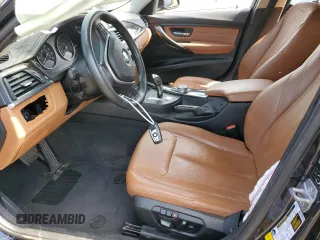 2015 BMW 3 Series 328i xDrive with VIN WBA3B5G50FNS16915, listed as a Copart auction lot 61603915 with 137,059 mi miles and Salvage title. Bid and sale history available at DreamBid. Image 7.