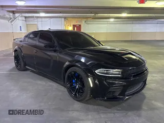 2021 Dodge Charger SRT Hellcat Redeye Widebody with VIN 2C3CDXL94MH659323, listed as a Copart auction lot 65648675 with 19,533 mi miles and Salvage title. Bid and sale history available at DreamBid. Image 1.