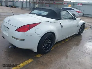 2005 Nissan 350Z Touring with VIN JN1AZ36A35M752130, listed as a IAAI auction lot 41275821 with NaN miles. Bid and sale history available at carsss.com. Image 4.