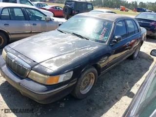 1998 Mercury Grand Marquis LS with VIN 2MEFM75W8WX680422, listed as a IAAI auction lot 41767379 with 1 mi miles. Bid and sale history available at carsss.com. Image 2.