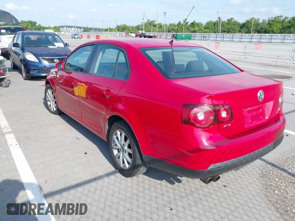 2010 Volkswagen Jetta Sedan S with VIN 3VWJZ7AJ9AM053897, listed as a IAAI auction lot 40300970 with 249,537 mi miles. Bid and sale history available at carsss.com. Image 3.