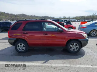 2007 Kia Sportage LX with VIN KNDJF724577371572, listed as a IAAI auction lot 41817960 with 213,062 mi miles. Bid and sale history available at carsss.com. Image 13.