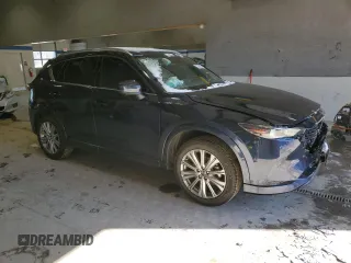 2023 Mazda CX-5 Signature with VIN JM3KFBXY0P0110949, listed as a Copart auction lot 46293245 with 47,081 mi miles and Clean Title. Bid and sale history available at carsss.com. Image 4.