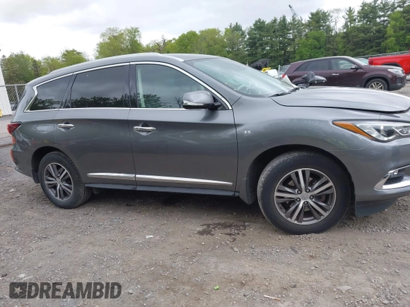 2020 Infiniti QX60 Luxe with VIN 5N1DL0MM1LC537478, listed as a IAAI auction lot 42323321 with 51,464 mi miles and . Bid and sale history available at DreamBid. Image 13.