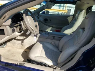 2004 Chevrolet Corvette with VIN 1G1YY22G145132963, listed as a Copart auction lot 74264184 with 74,077 mi miles and Salvage Title. Bid and sale history available at carsss.com. Image 7.