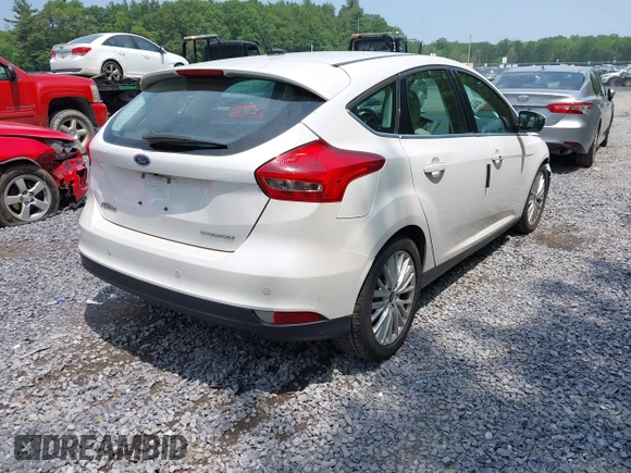 2016 Ford Focus Titanium with VIN 1FADP3N26GL332709, listed as a IAAI auction lot 42458997 with 75,509 mi miles and . Bid and sale history available at DreamBid. Image 4.