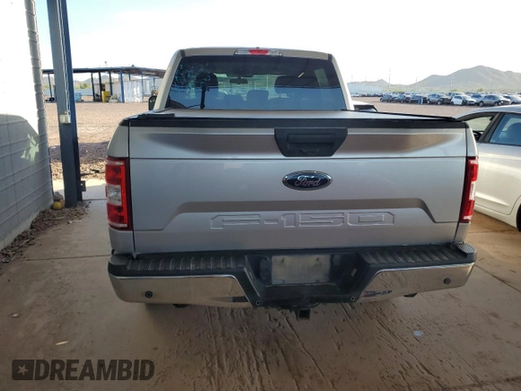 2018 Ford F-150 XL with VIN 1FTEW1E58JFA19859, listed as a Copart auction lot 63862625 with 77,463 mi miles and Salvage title. Bid and sale history available at DreamBid. Image 6.