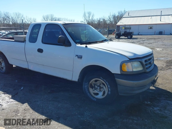 2002 Ford F-150 XL with VIN 1FTRX17L72NA76720, listed as a IAAI auction lot 41738935 with 92,506 mi miles. Bid and sale history available at carsss.com. Image 1.