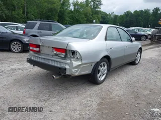 2001 Lexus ES 300 z VIN JT8BF28G910291019, wystawiony jako IAAI lot #42488530 z przebiegiem 170 168 mil mil oraz . Historia ofert i sprzedaży dostępna na DreamBid. Obrazek 4.