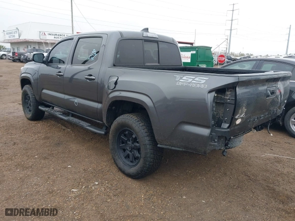 2023 Toyota Tacoma 4WD SR with VIN 3TYCZ5AN5PT157657, listed as a IAAI auction lot 41412536 with 12,828 mi miles. Bid and sale history available at carsss.com. Image 3.