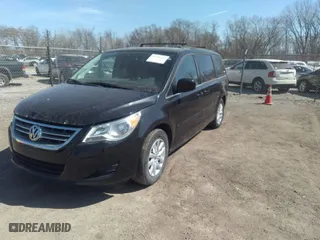 2014 Volkswagen Routan SE w/RSE & Navigation with VIN 2C4RVABG3ER134698, listed as a IAAI auction lot 41796736 with 110,282 mi miles. Bid and sale history available at carsss.com. Image 2.