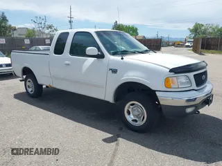 2001 Ford F-150 XL z VIN 1FTRX18W31KF80478, wystawiony jako IAAI lot #42219605 z przebiegiem 127 284 mil mil oraz . Historia ofert i sprzedaży dostępna na DreamBid. Obrazek 1.
