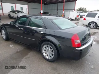 2005 Chrysler 300 with VIN 2C3AA63H45H674987, listed as a IAAI auction lot 41560730 with 101,659 mi miles. Bid and sale history available at carsss.com. Image 3.