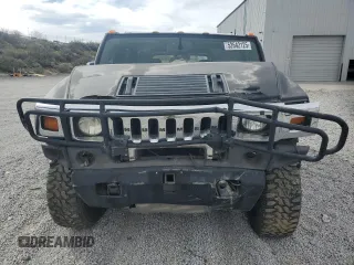 2004 Hummer H2 z VIN 5GRGN23U74H100175, wystawiony jako Copart lot #52642125 z przebiegiem 112 305 mil mil oraz Szkoda całkowita • Salvage title. Historia ofert i sprzedaży dostępna na DreamBid. Obrazek 5.