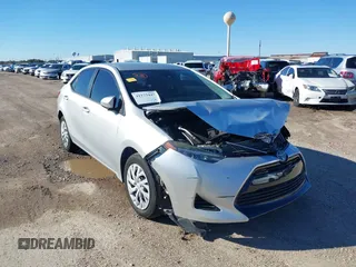 2018 Toyota Corolla L z VIN 5YFBURHE5JP774317, wystawiony jako IAAI lot #41173447 z przebiegiem 87 003 mil mil oraz . Historia ofert i sprzedaży dostępna na DreamBid. Obrazek 1.