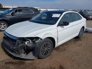 2021 Volkswagen Jetta S z VIN 3VWC57BU9MM034560, wystawiony jako IAAI lot #42239655 z przebiegiem 75 424 mil mil oraz . Historia ofert i sprzedaży dostępna na DreamBid. Obrazek 2.