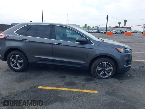 2023 Ford Edge SEL z VIN 2FMPK4J98PBA03830, wystawiony jako IAAI lot #41992054 z przebiegiem 21 081 mil mil oraz . Historia ofert i sprzedaży dostępna na DreamBid. Obrazek 13.
