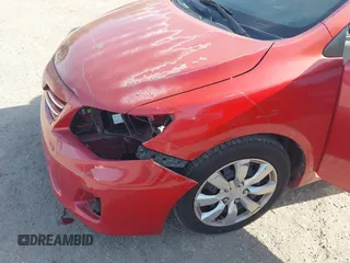 2013 Toyota Corolla L with VIN 2T1BU4EE6DC041849, listed as a IAAI auction lot 42077563 with 145,006 mi miles. Bid and sale history available at carsss.com. Image 6.