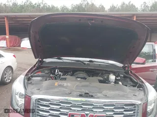 2020 GMC Yukon XL Denali with VIN 1GKS1HKJ7LR170497, listed as a IAAI auction lot 41562109 with 97,357 mi miles. Bid and sale history available at carsss.com. Image 10.