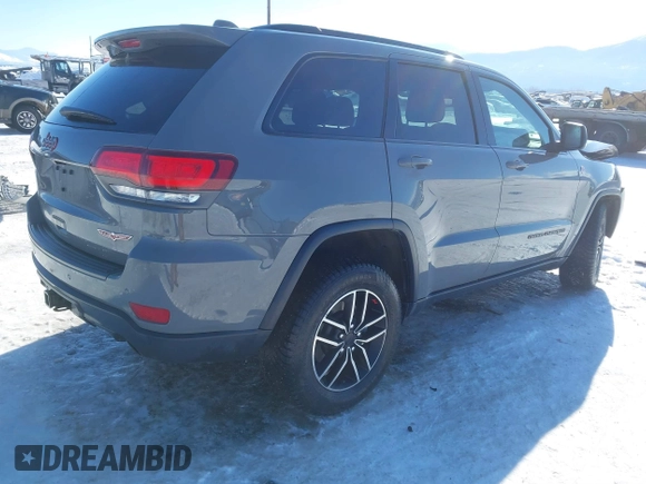 2021 Jeep Grand Cherokee Trailhawk with VIN 1C4RJFLG2MC854007, listed as a IAAI auction lot 41512394 with 50,674 mi miles. Bid and sale history available at carsss.com. Image 4.