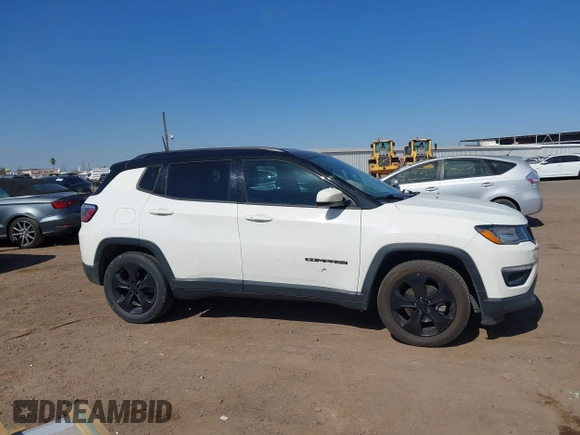 2018 Jeep Compass Latitude with VIN 3C4NJCBB3JT462141, listed as a IAAI auction lot 42024920 with 84,988 mi miles and . Bid and sale history available at DreamBid. Image 13.