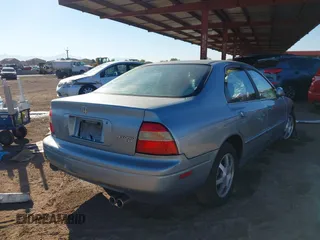 1995 Honda Accord EX w/Leather with VIN 1HGCD5666SA075326, listed as a IAAI auction lot 41266376 with 139,204 mi miles. Bid and sale history available at carsss.com. Image 4.