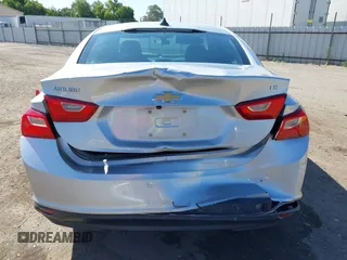 2016 Chevrolet Malibu LS z VIN 1G1ZB5ST9GF340558, wystawiony jako IAAI lot #42520463 z przebiegiem 104 296 mil mil oraz . Historia ofert i sprzedaży dostępna na DreamBid. Obrazek 16.