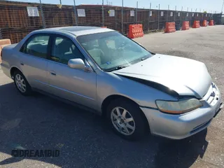 2002 Honda Accord SE с VIN 1HGCG56712A041830, выставлен на аукционе IAAI как лот 42001605 с пробегом 201 451 миль миль и . История ставок и продаж доступна на DreamBid. Изображение 1.