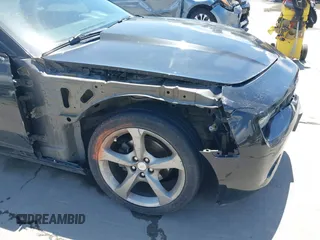 2013 Chevrolet Camaro LT z VIN 2G1FB1E32D9182026, wystawiony jako IAAI lot #42228559 z przebiegiem 210 159 mil mil oraz . Historia ofert i sprzedaży dostępna na DreamBid. Obrazek 6.